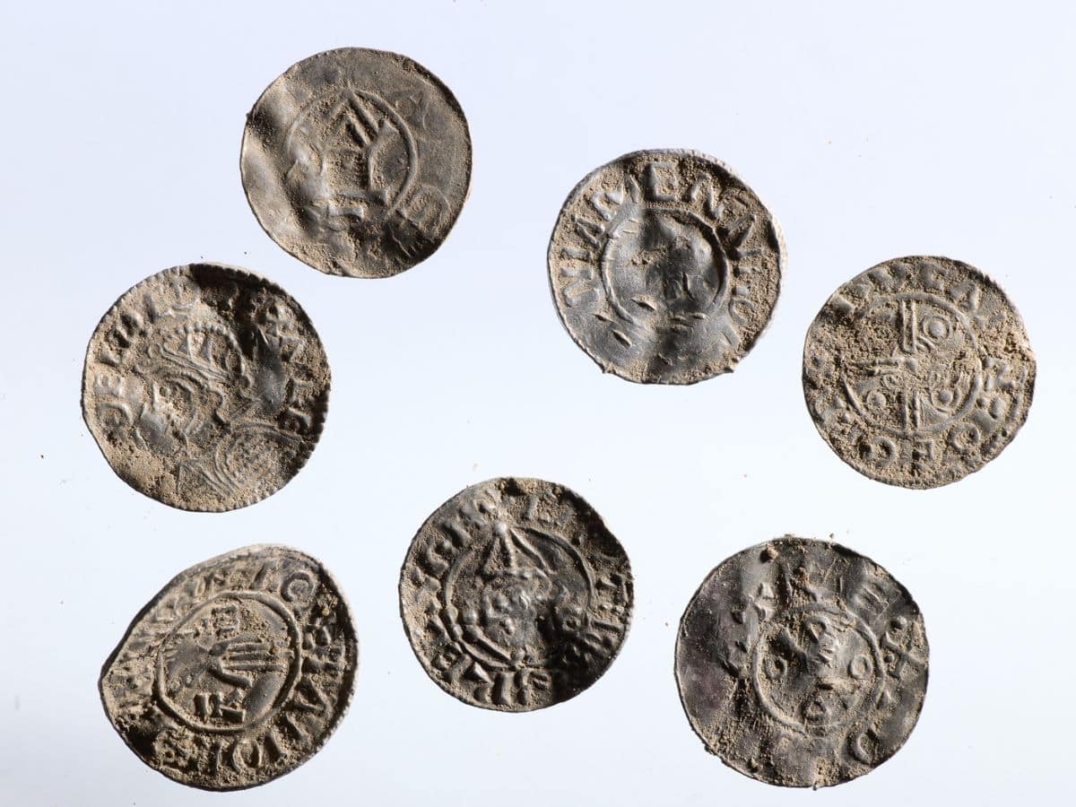 Collection of six English and German coins recovered  adjacent  together