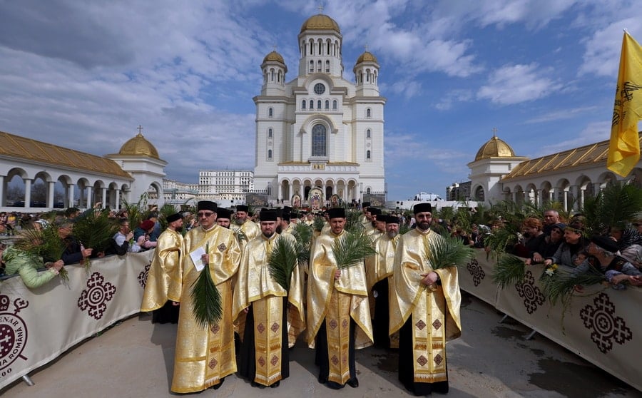 Romanian Priests carry Palm Branches
