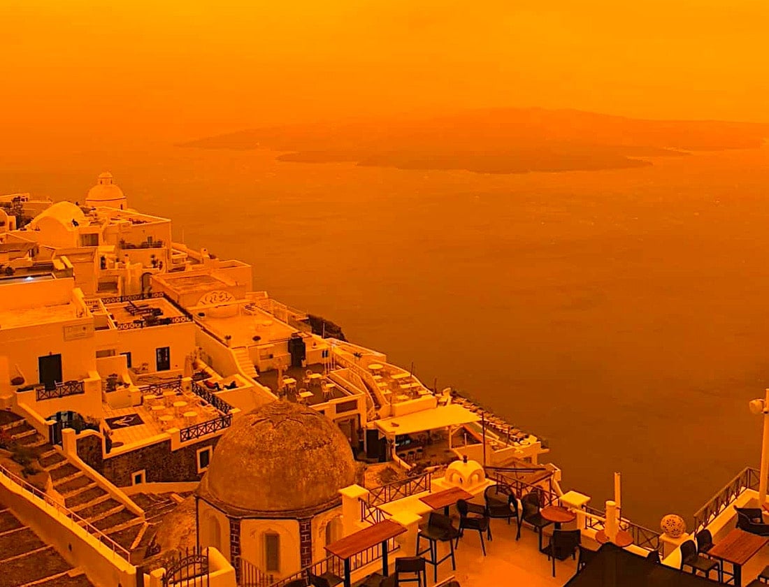 Sahara Dust Turns Sky Eerie Red in Santorini