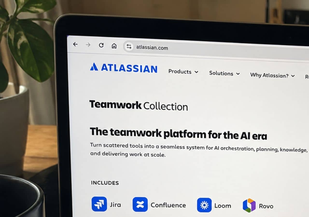 Laptop displaying Atlassian website