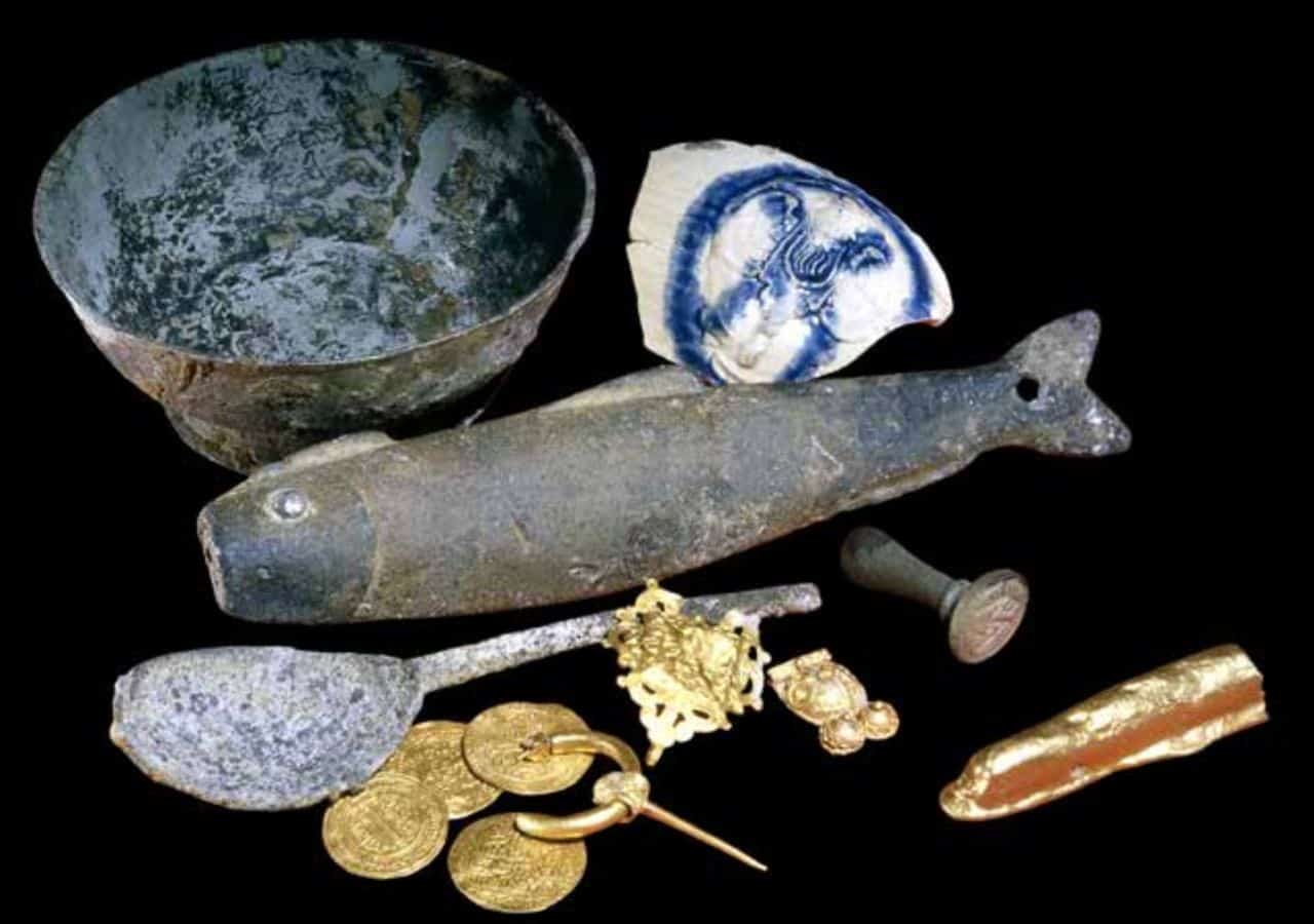 Items recovered from the Salcombe shipwreck, including pewter, pottery and gold coins
