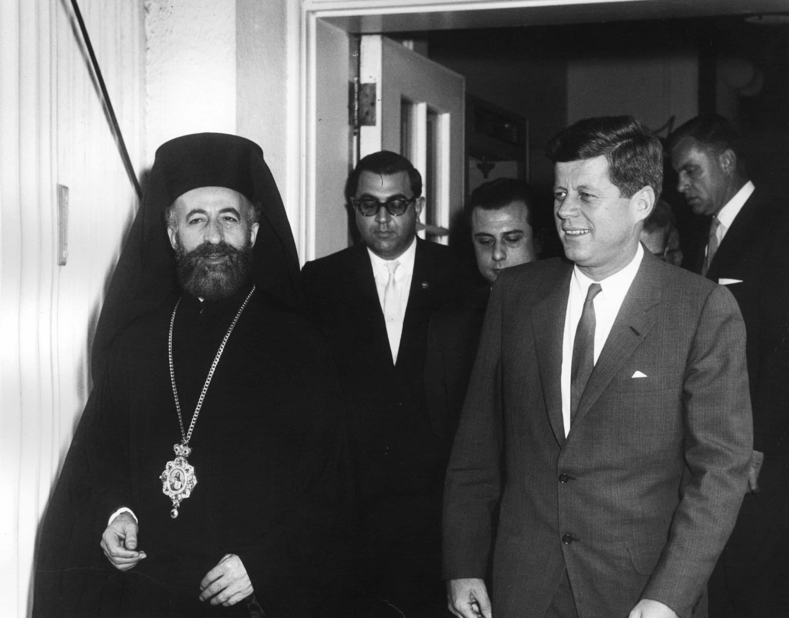 Archbishop Makarios III walking with President John F. Kennedy at the White House in 1962.
