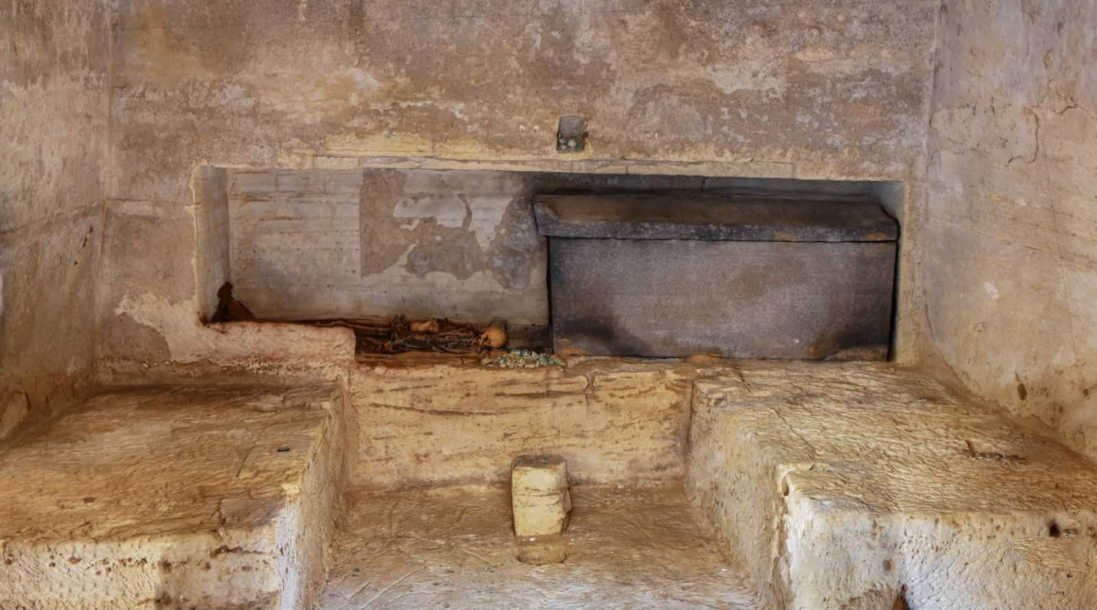 A granite sarcophagus remains sealed inside one of the newly excavated tombs
