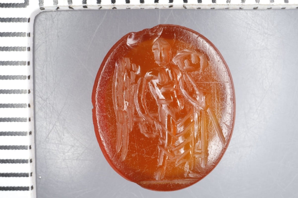 Carnelian gem depicting the goddess of victory, Victoria, with staff and wreath
