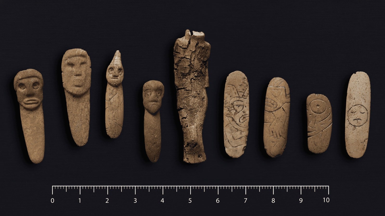 Carved wooden and bone ceremonial objects discovered in a 3,800-year-old ritual offering at Peñico