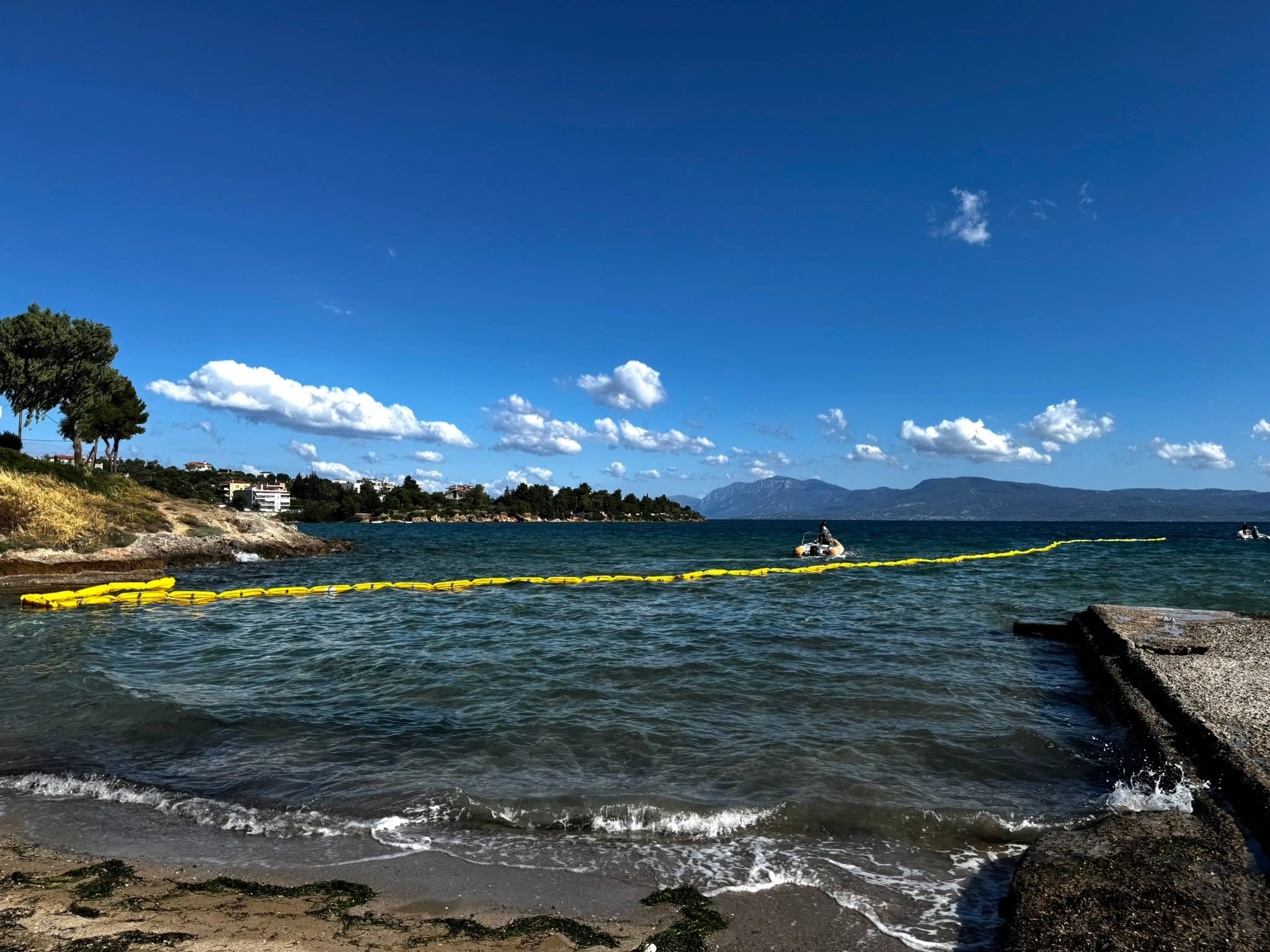 The installation of special floating barriers on beaches