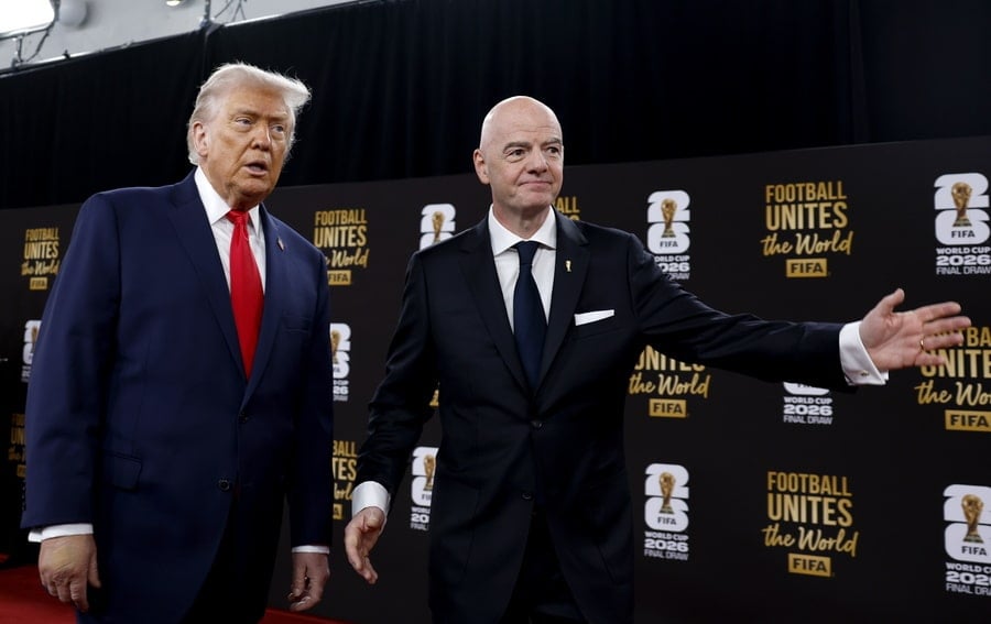 U.S. President Donald Trump stands beside FIFA President Gianni Infantino at a FIFA World Cup 2026 event.