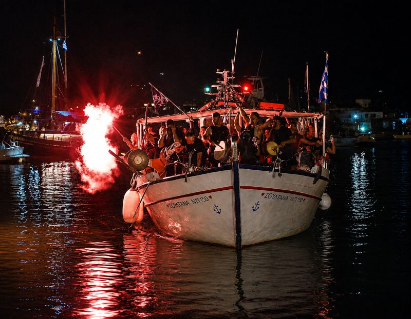 The Koursariki Vradhia (Corsair Night or Pirate Night) in Naousa, Paros reenacts the arrival of corsairs in the harbor during the August 23 celebration.