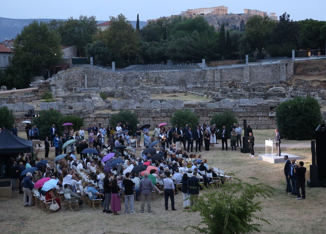 The Kerameikos archaeological site in Athens during the inauguration of its newly upgraded facilities, with the Acropolis visible in the background.
