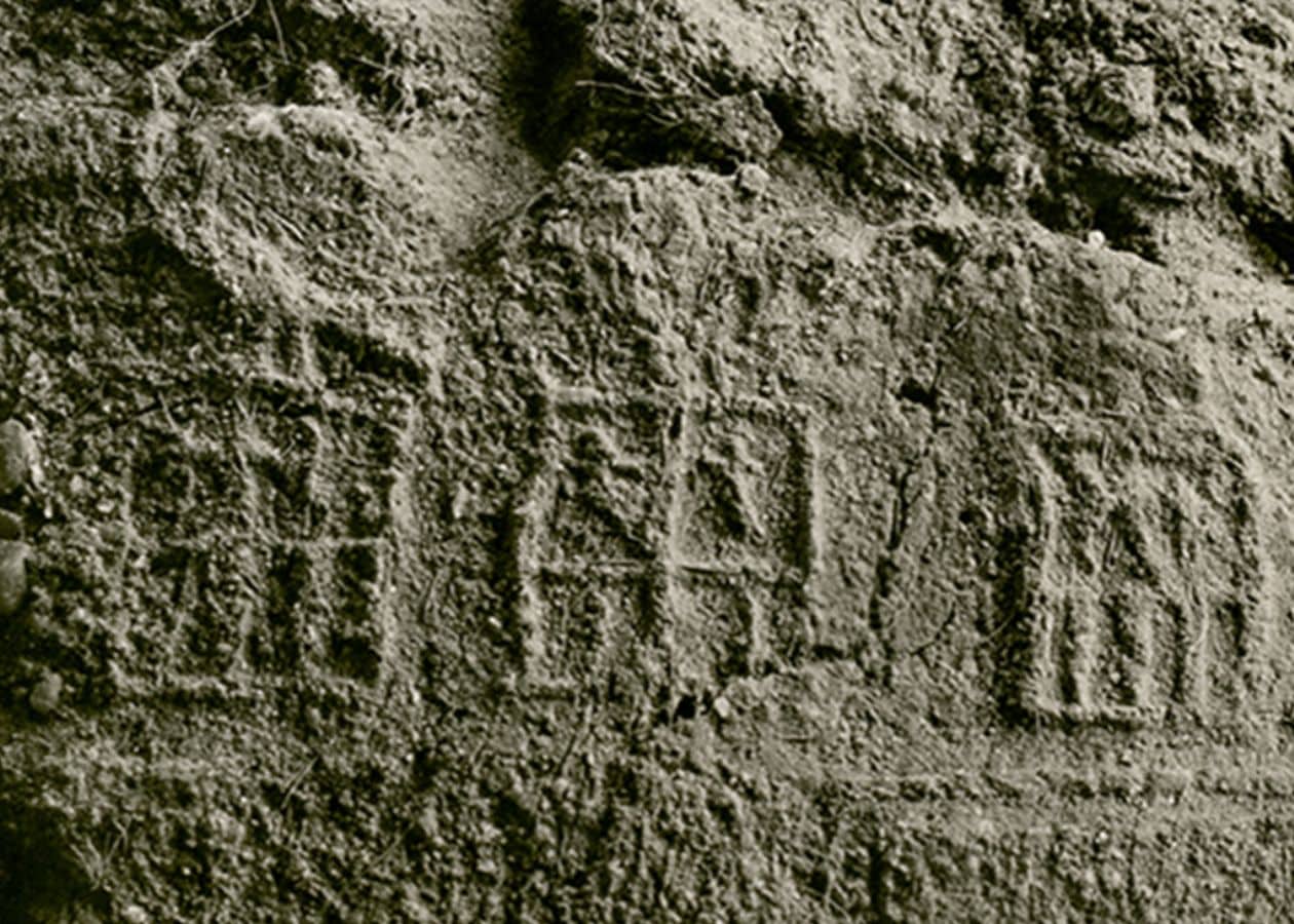 A close-up scan of the ancient clay seal from Saqqara, showing the faint nameplates linked to Meretneith