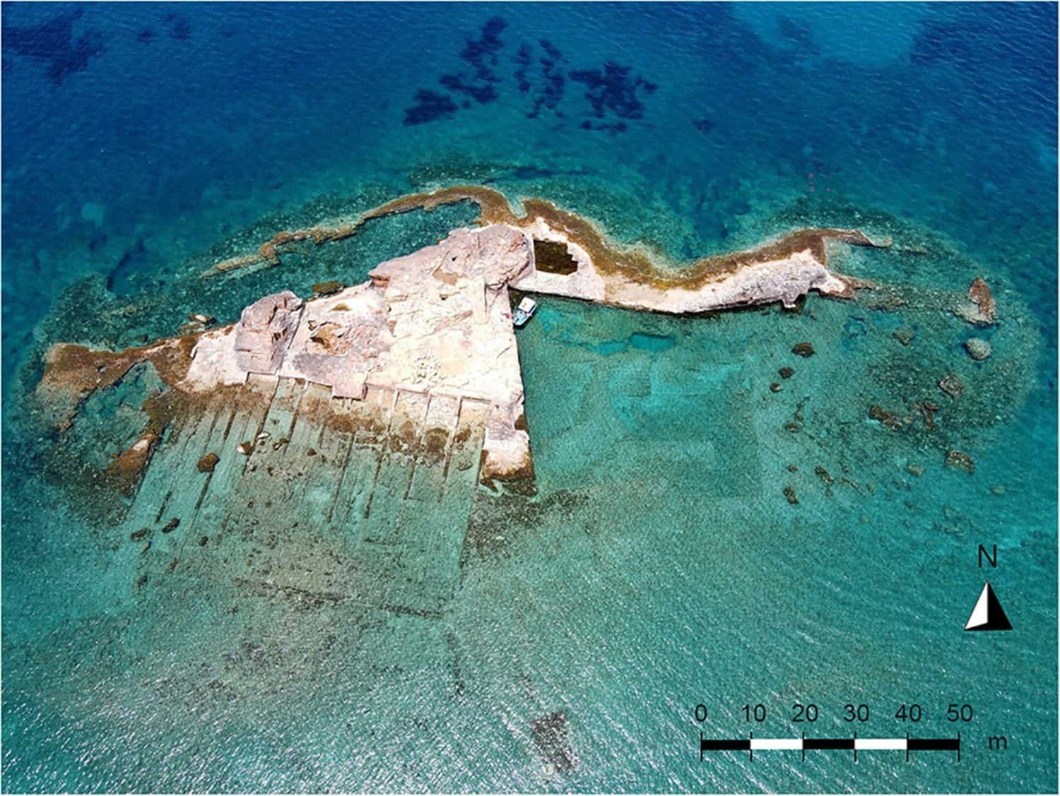 Drone image of Hammam Island showing slipways and extensive removal of bedrock