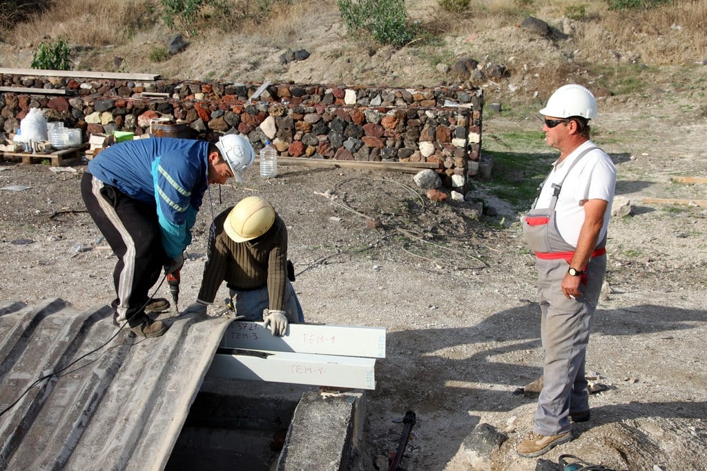 Workers at the archaeological site of Akrotiri, Greece