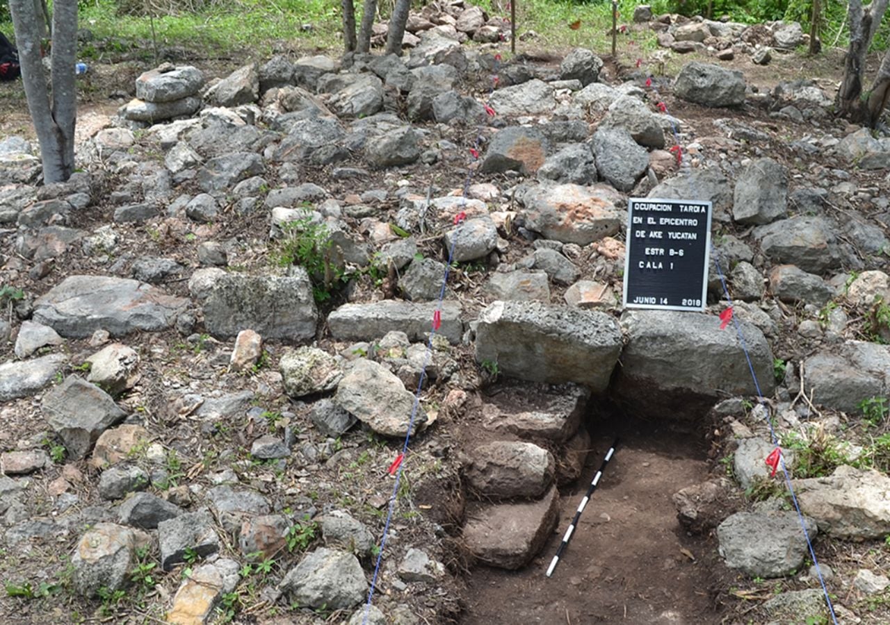 A late mound in Ake’s epicenter, with blocks from monumental buildings reused in its foundation