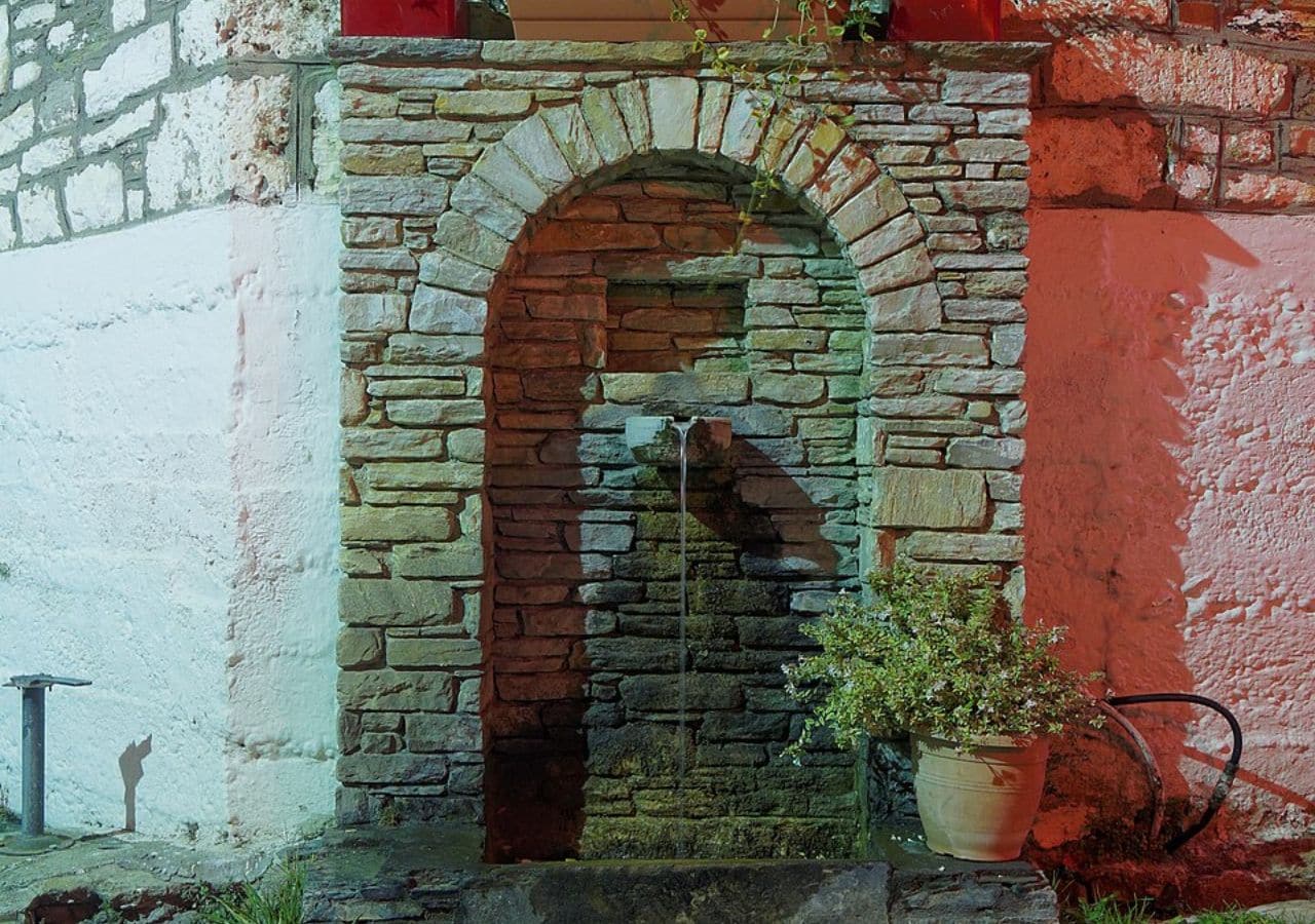 A traditional water fountain in Portaria, the neighboring Greek village whose supply network was connected to Stagiates after its original spring connection was cut in 2020