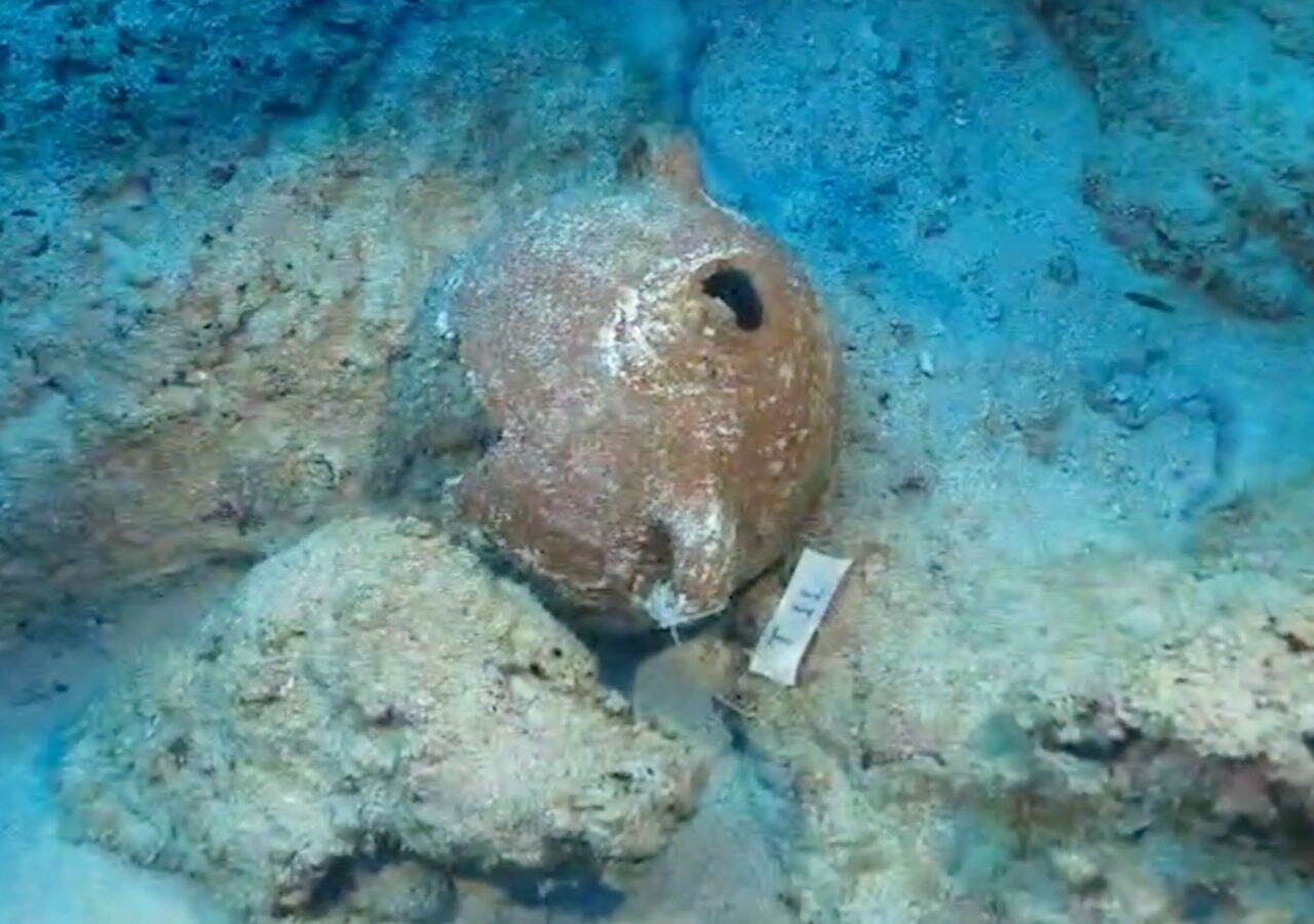 An ancient clay jar discovered at the 4,700-year-old shipwreck site in the Mediterranean