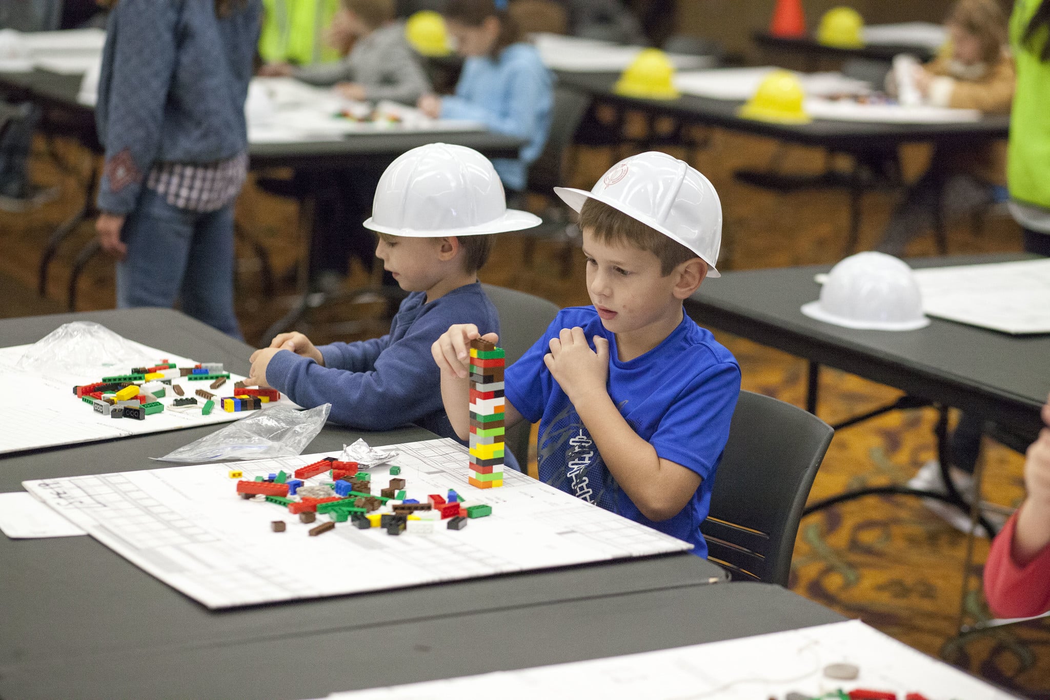 Children constructing structures using blocks