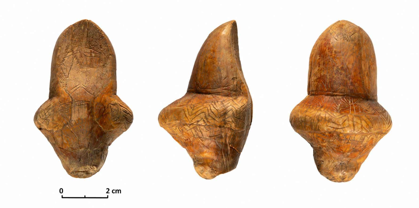 Front, side, and back views of the 18,000-year-old F4 Venus figurine