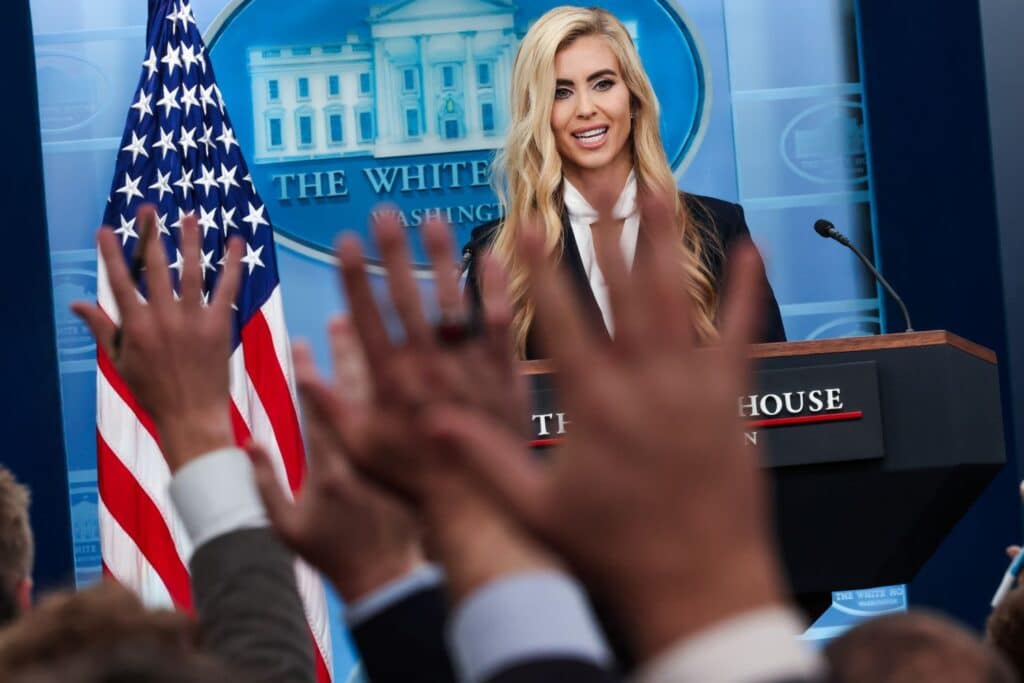 Katie Zacharia addresses reporters during White House press briefing.